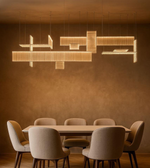 Grid-style modular chandelier hanging in a modern dining room