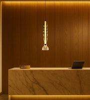 Daya Worldwide Lucent Wave pendant light hanging with a modern design, showcasing smooth curves and elegant illumination.