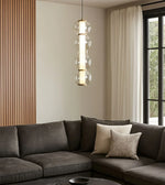 Daya Worldwide Radiant Glow pendant light hanging from ceiling with warm illumination, modern design for stylish home lighting.