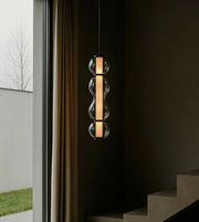 Daya Worldwide Radiant Glow pendant light hanging fixture with a sleek, modern design and warm illumination.