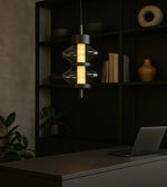 Daya Worldwide Ethereal Glow pendant light with a sleek, modern design hanging from the ceiling in a stylish interior.
