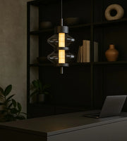 Daya Worldwide Ethereal Glow pendant light with a sleek, modern design hanging from the ceiling in a stylish interior.